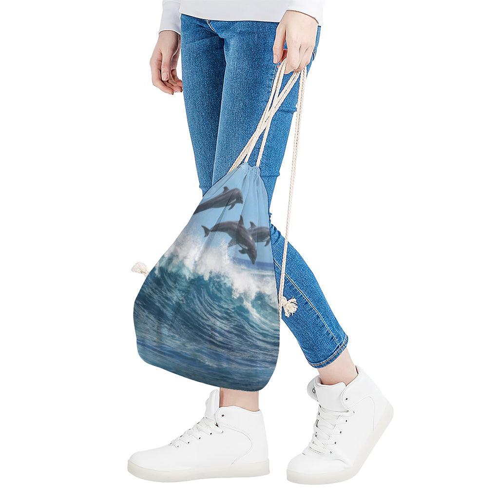 Dolphins Jumping Over Waves Print Drawstring Bag