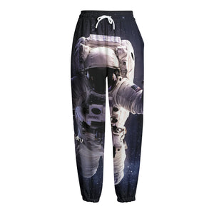 Astronaut Floating In Outer Space Print Fleece Lined Knit Pants