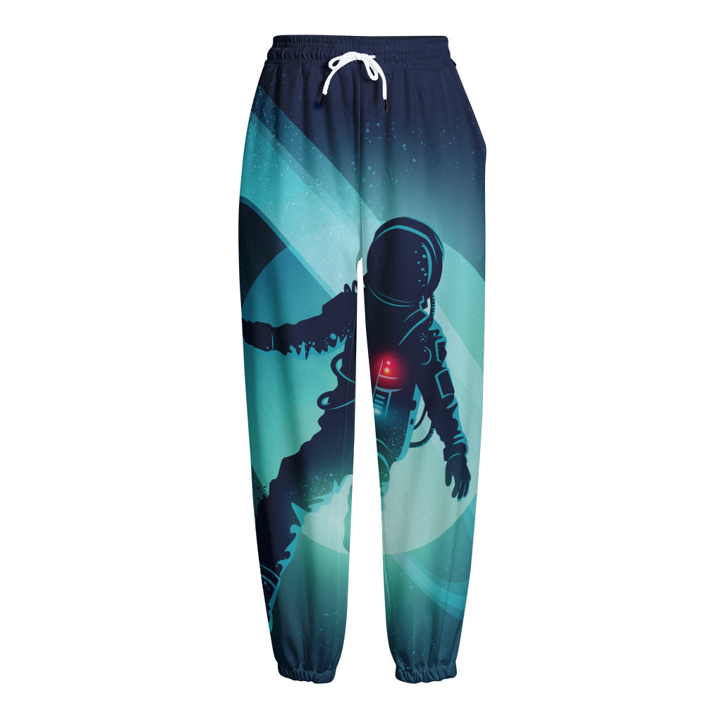 Astronaut Floating Through Space Print Fleece Lined Knit Pants