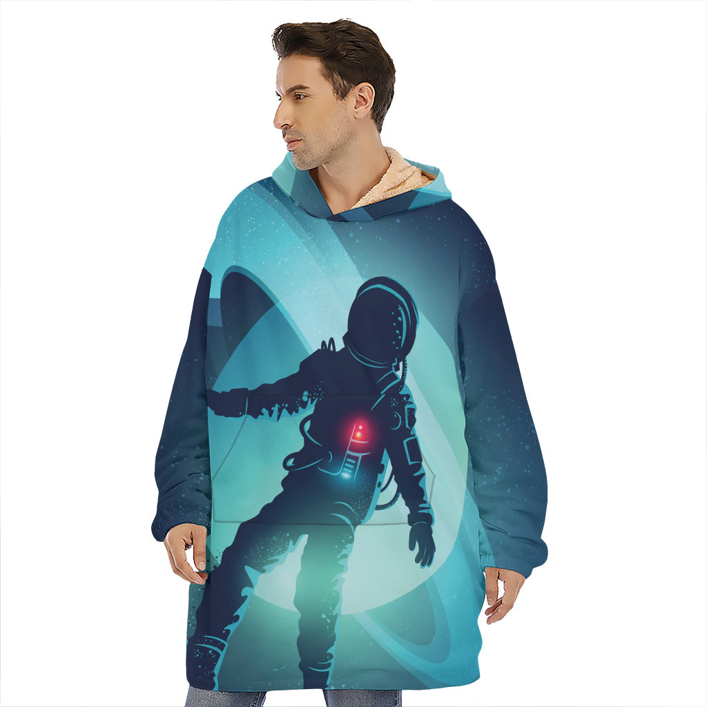 Astronaut Floating Through Space Print Hoodie Blanket