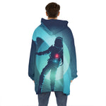 Astronaut Floating Through Space Print Hoodie Blanket