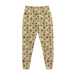 Beige Paw And Bone Pattern Print Jogger Pants