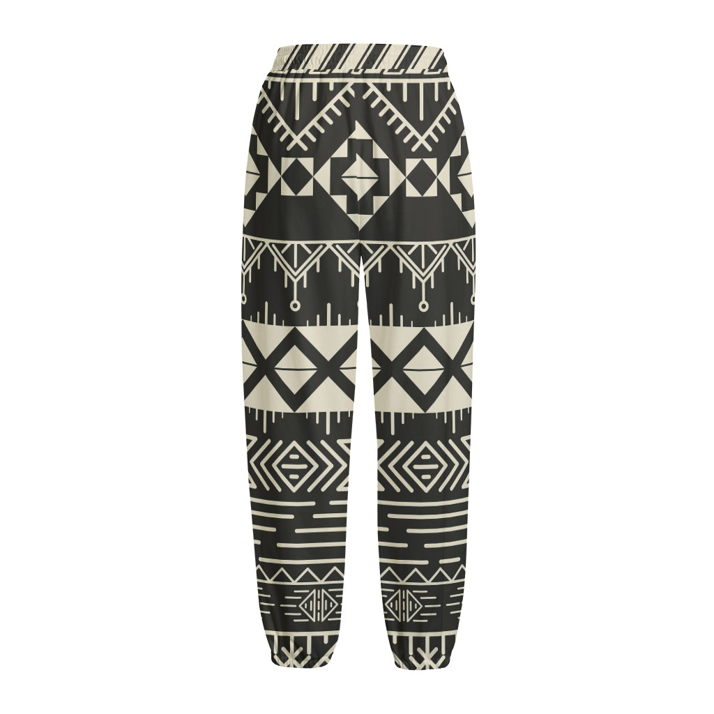 Black And Beige Aztec Pattern Print Fleece Lined Knit Pants