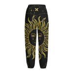Black And Gold Celestial Sun Print Fleece Lined Knit Pants