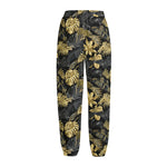 Black And Gold Tropical Pattern Print Fleece Lined Knit Pants