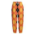 Black And Orange Argyle Pattern Print Fleece Lined Knit Pants