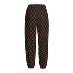 Black And Orange Harlequin Print Fleece Lined Knit Pants