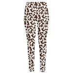 Brown And White Cow Pattern Print High-Waisted Pocket Leggings