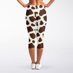 Brown And White Cow Print Women's Capri Leggings