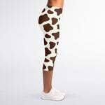 Brown And White Cow Print Women's Capri Leggings