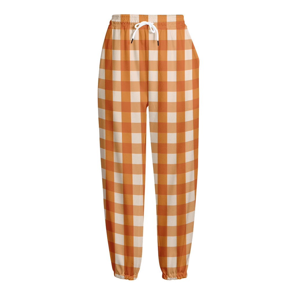 Burnt Orange And White Check Print Fleece Lined Knit Pants