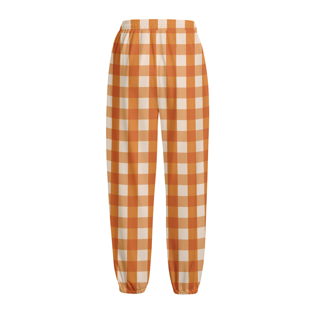 Burnt Orange And White Check Print Fleece Lined Knit Pants