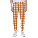 Burnt Orange And White Check Print Scuba Joggers