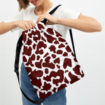 Chocolate Brown And White Cow Print Drawstring Backpack