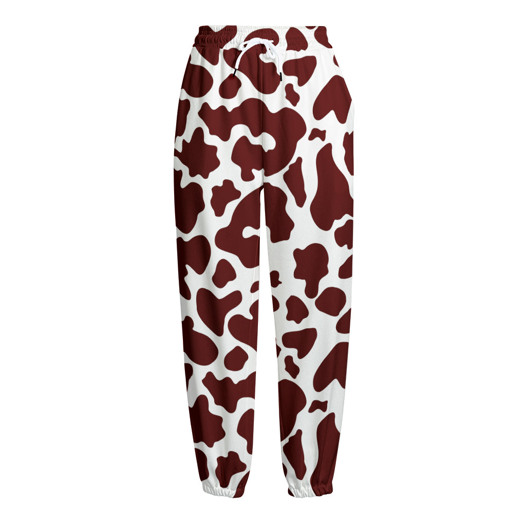 Chocolate Brown And White Cow Print Fleece Lined Knit Pants