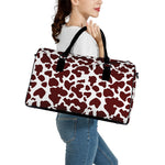 Chocolate Brown And White Cow Print Leather Duffle Bag