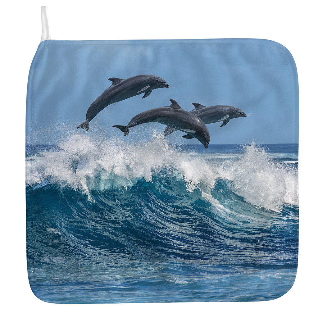 Dolphins Jumping Over Waves Print Hand Towel