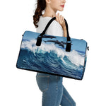 Dolphins Jumping Over Waves Print Leather Duffle Bag