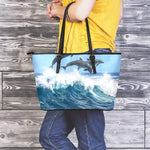 Dolphins Jumping Over Waves Print Leather Tote Bag