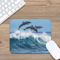 Dolphins Jumping Over Waves Print Mouse Pad
