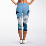 Dolphins Jumping Over Waves Print Women's Capri Leggings