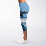 Dolphins Jumping Over Waves Print Women's Capri Leggings