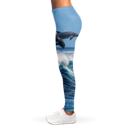 Dolphins Jumping Over Waves Print Women's Leggings