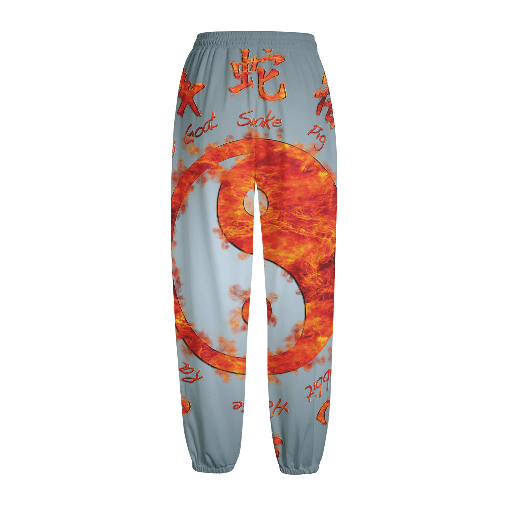 Fire Yin Yang Chinese Zodiac Print Fleece Lined Knit Pants
