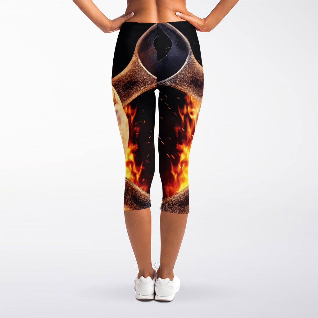 Flaming Skull And Cross Wrench Print Women's Capri Leggings