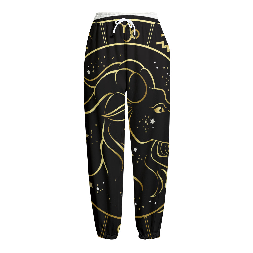 Gold And Black Capricorn Sign Print Fleece Lined Knit Pants