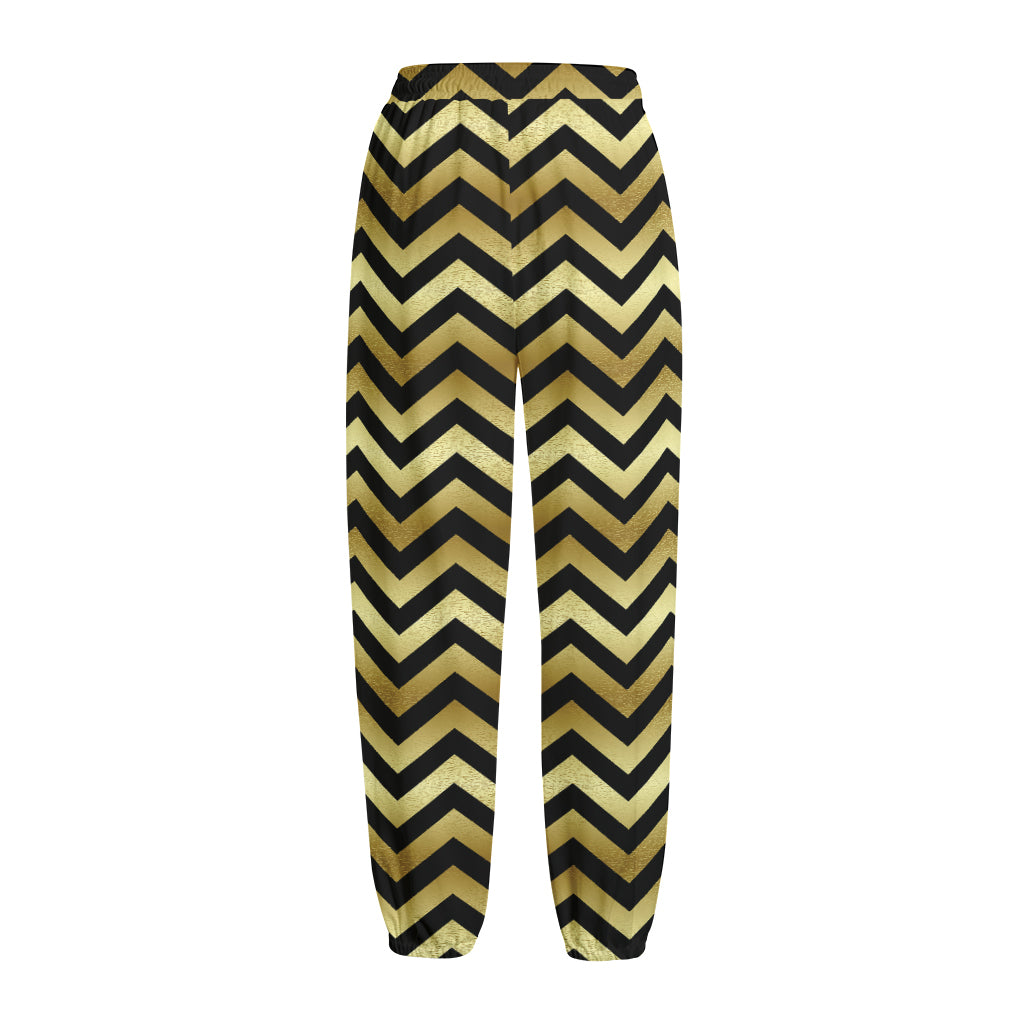 Gold And Black Chevron Pattern Print Fleece Lined Knit Pants