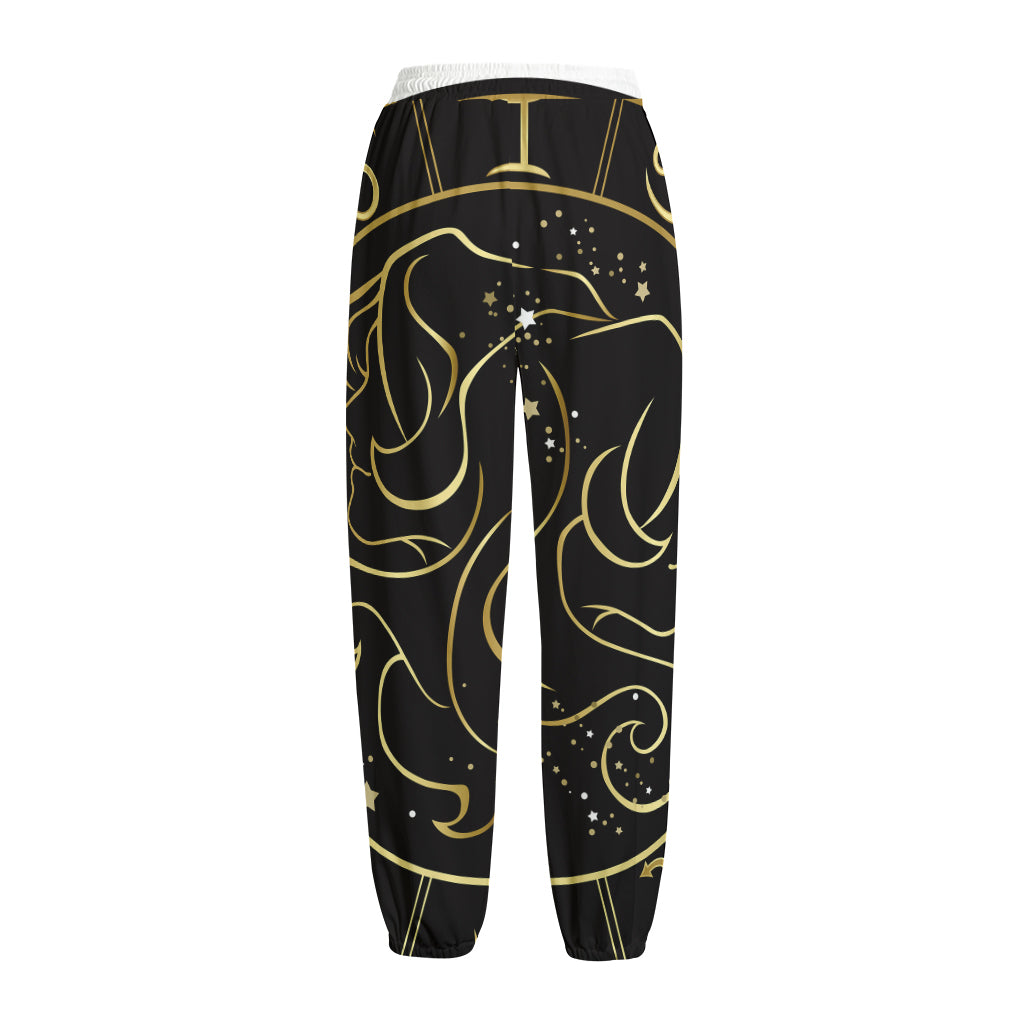 Gold And Black Gemini Sign Print Fleece Lined Knit Pants