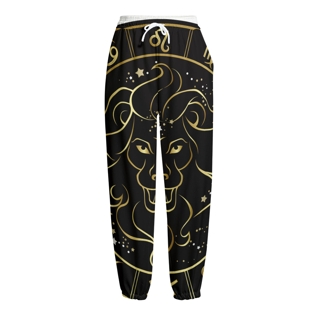 Gold And Black Leo Sign Print Fleece Lined Knit Pants
