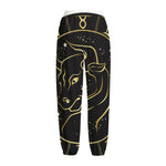 Gold And Black Taurus Sign Print Fleece Lined Knit Pants
