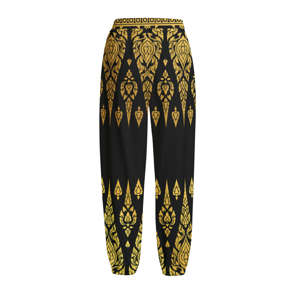 Gold And Black Thai Pattern Print Fleece Lined Knit Pants