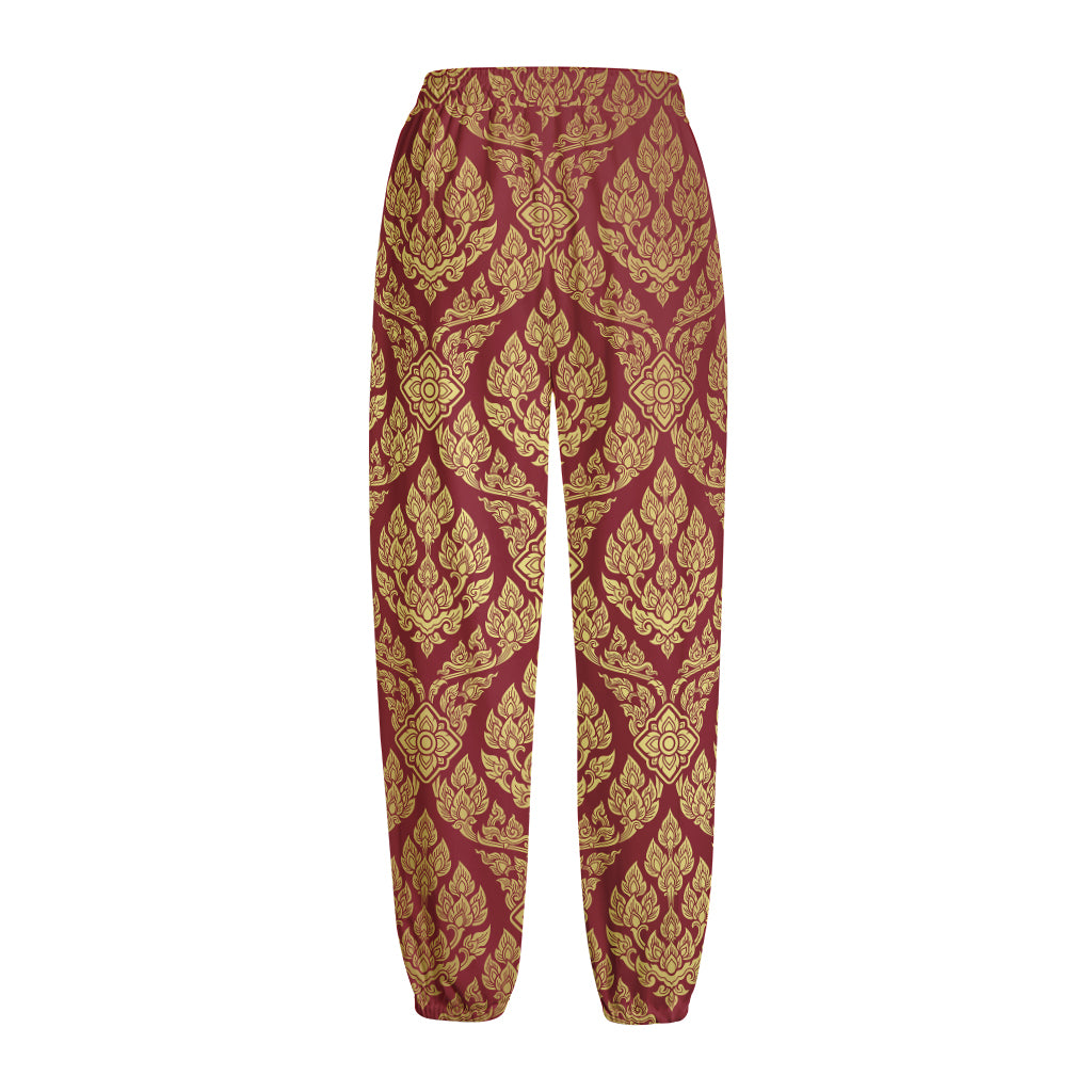 Gold And Red Thai Pattern Print Fleece Lined Knit Pants