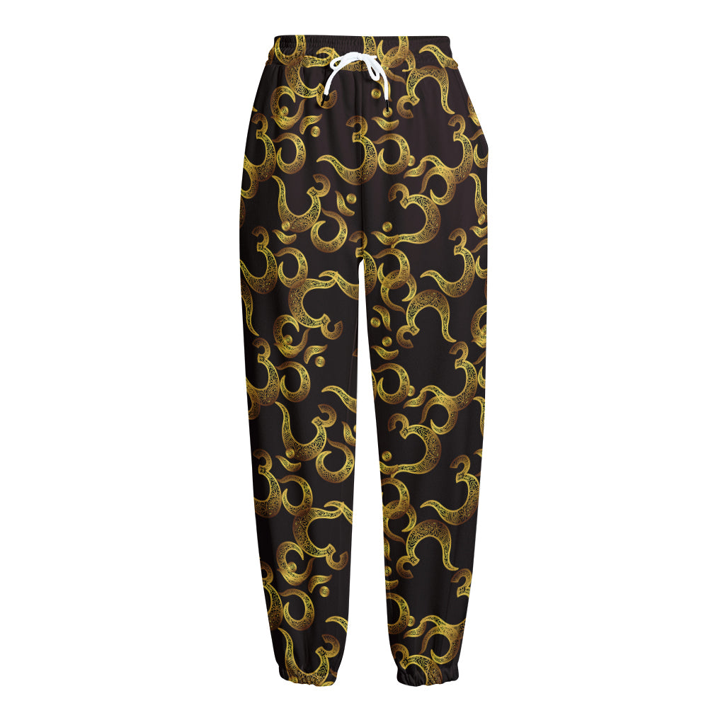 Gold Om Symbol Pattern Print Fleece Lined Knit Pants