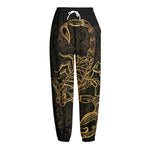 Gold Scorpio Print Fleece Lined Knit Pants
