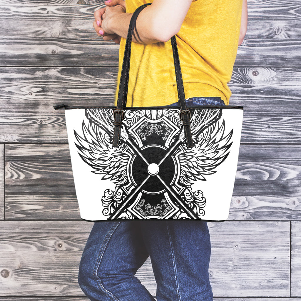 Lacrosse Sticks And Ornate Wing Print Leather Tote Bag