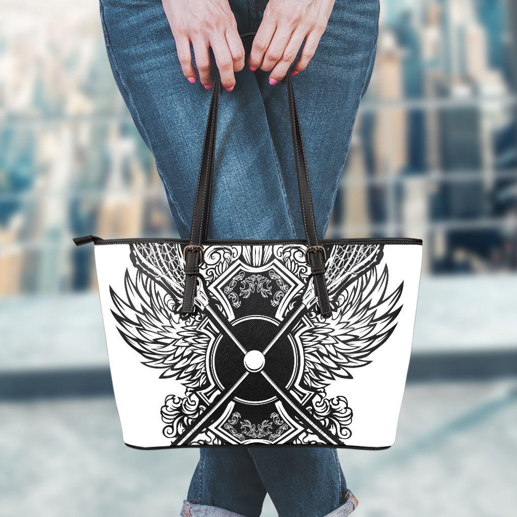 Lacrosse Sticks And Ornate Wing Print Leather Tote Bag