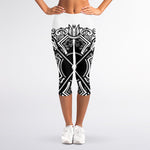 Lacrosse Sticks And Ornate Wing Print Women's Capri Leggings