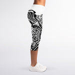 Lacrosse Sticks And Ornate Wing Print Women's Capri Leggings
