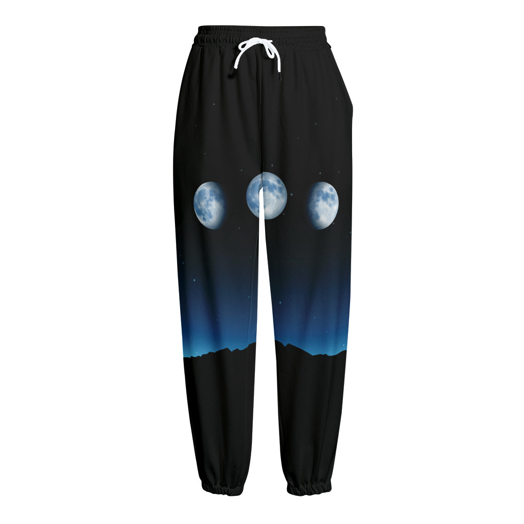 Night Sky And Moon Phase Print Fleece Lined Knit Pants