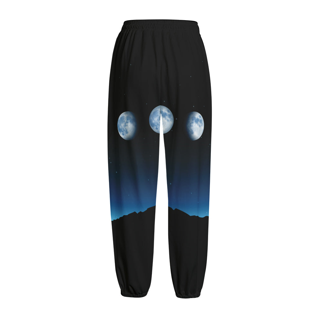 Night Sky And Moon Phase Print Fleece Lined Knit Pants
