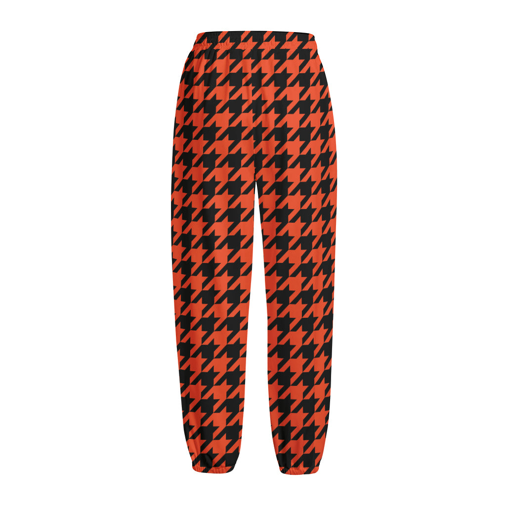 Orange And Black Houndstooth Print Fleece Lined Knit Pants