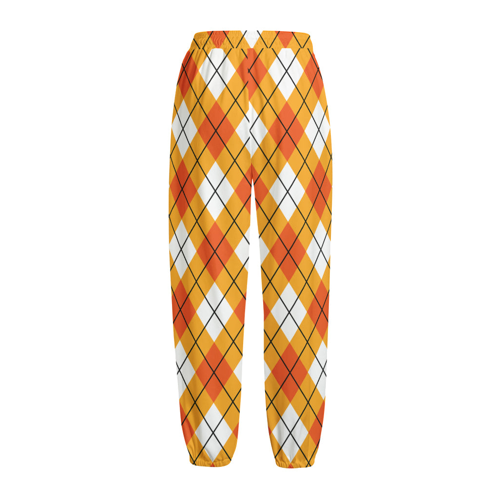 Orange And White Argyle Pattern Print Fleece Lined Knit Pants