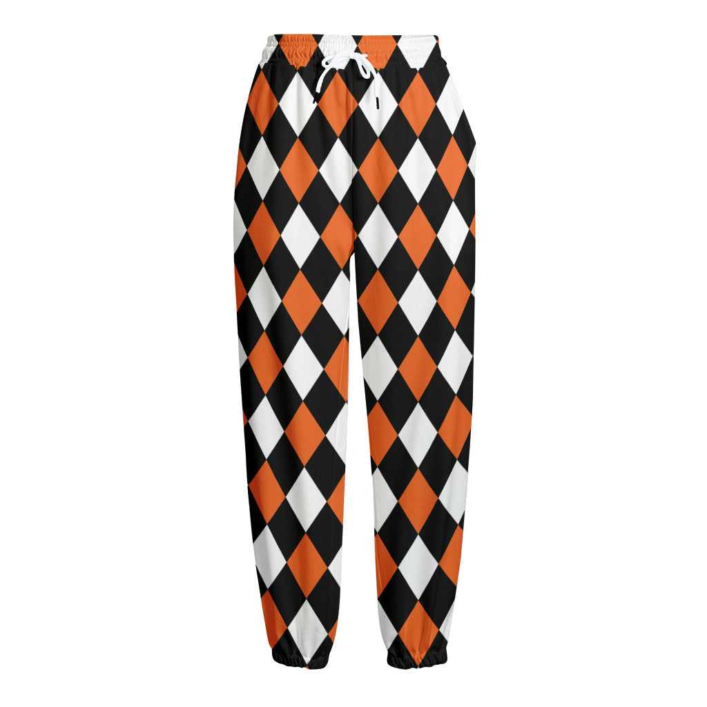Orange Black And White Harlequin Print Fleece Lined Knit Pants