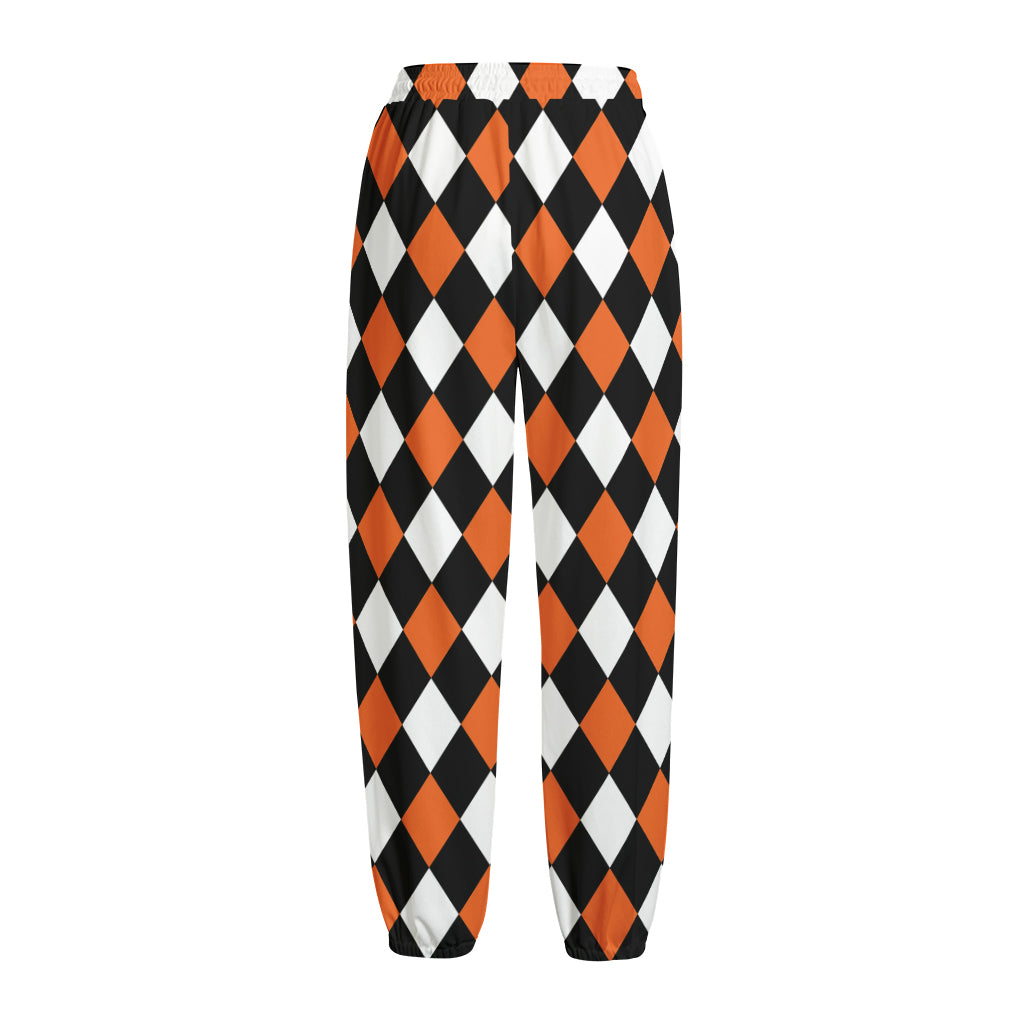 Orange Black And White Harlequin Print Fleece Lined Knit Pants