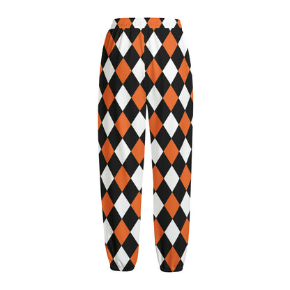 Orange Black And White Harlequin Print Fleece Lined Knit Pants