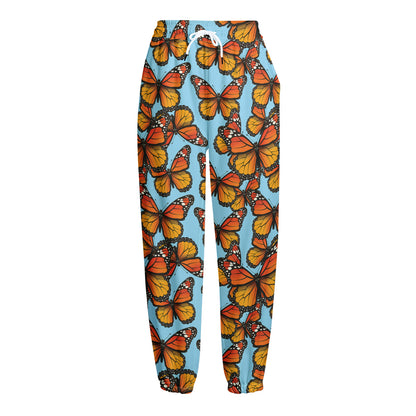 Orange Monarch Butterflies Pattern Print Fleece Lined Knit Pants